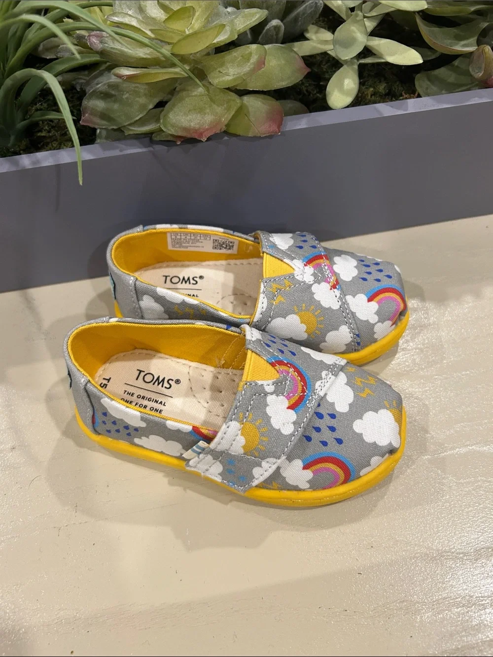 TOMS Kids Gray Canvas Slip-On Shoes with Rainbow & Yellow Trim